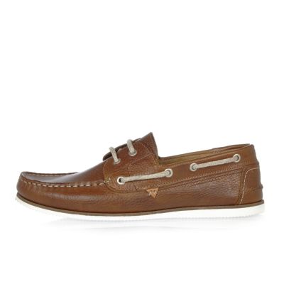Tan leather boat shoes
